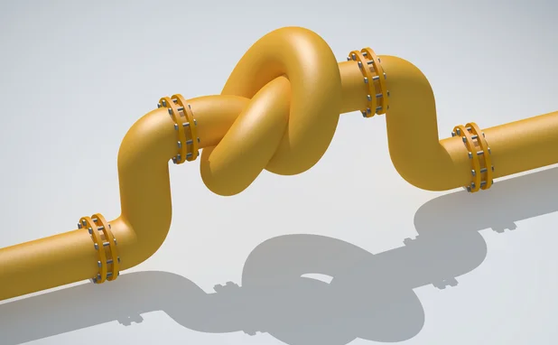 Yellow pipe with a knot in it
