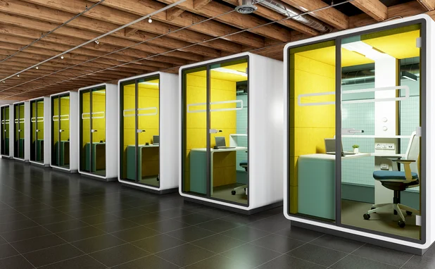 Separate empty modern office cubicles in a row