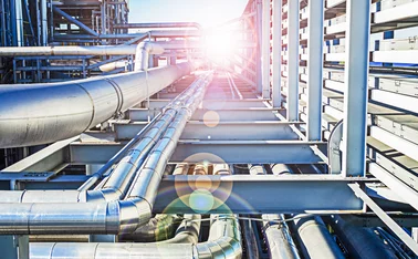 Abstract view of a set of pipelines running through a liquefied gas production plant