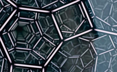 Illuminated geometric lattice forming an abstract futuristic network tunnel