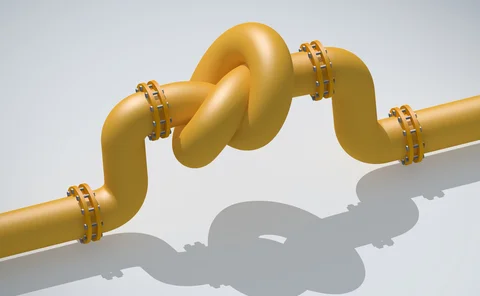 Yellow pipe with a knot in it