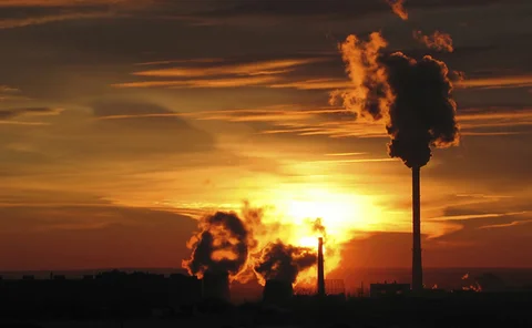 russia-power-station-smoke-belching-out-of-chimneys-at-sunset