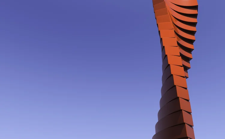 A tall, modern red sculpture with a twisting, stacked design rises against a clear blue sky, featuring smooth, geometric layers that create a dynamic spiral effect, standing out vividly due to its bold red colour and minimalist backdrop.