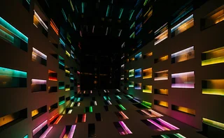 Futuristic abstract interior with colorful neon geometric patterns, creating a modern light display